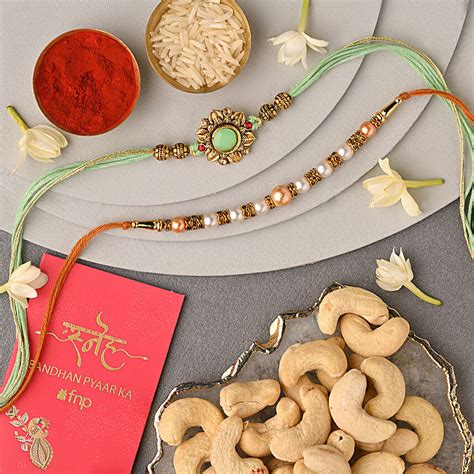 Buy Send Sneh Pearl Meenakari Rakhi Set With Cashews Combo Online Fnp