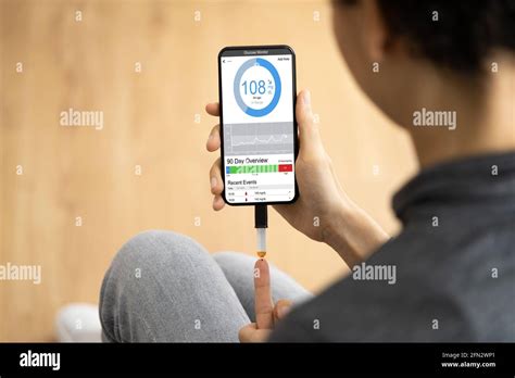 Blood Sugar Glucose Level Device With Glucometer Mobile Phone App Stock ...