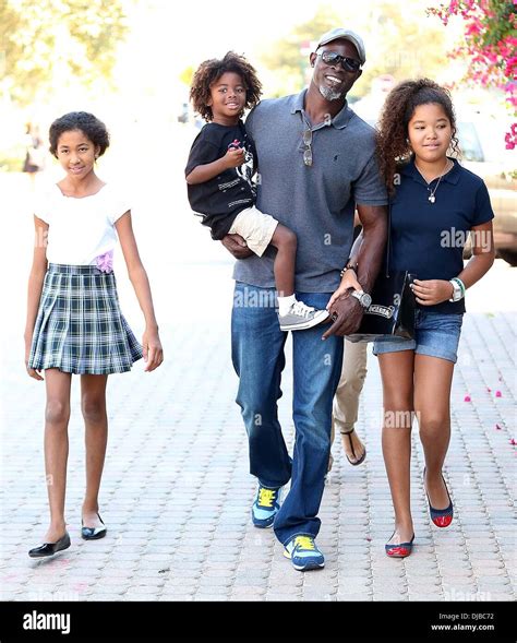 Kenzo Lee Hounsou Djimon Hounsou Ming Lee Simmons And Aoki Lee Simmons Djimon Hounsou At The