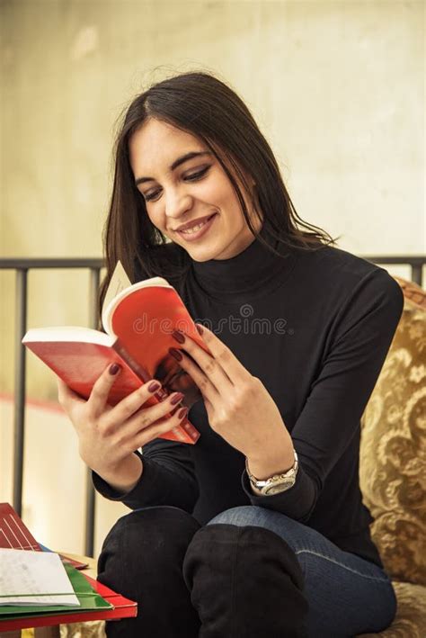 Young Female Student Reading A Book In A Cafe Stock Image Image Of