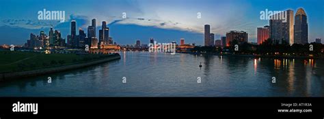 Singapore skyline panorama dusk Stock Photo - Alamy