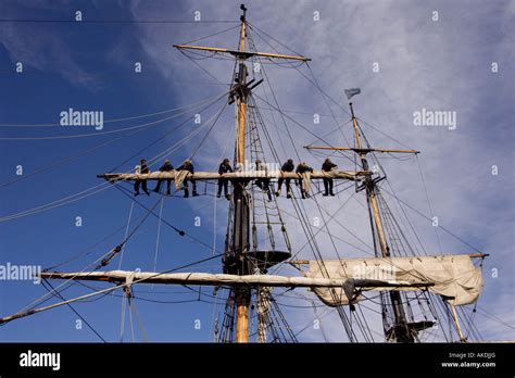 Sailors Rigging Sails On Earl Of Pembroke Tall Ship Before Leaving