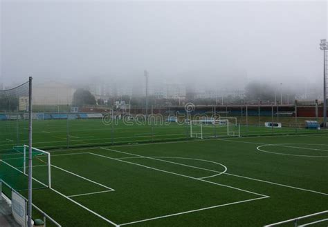 The Green Football Fields for Training the Game of Football are Foggy. Stock Image - Image of ...