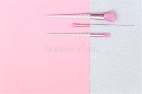 Three Unicorn Makeup Brushes On Silver Violet Foto De Stock Imagem De