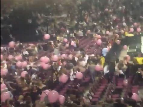 Manchester 'explosions': Video shows screaming crowd fleeing Ariana