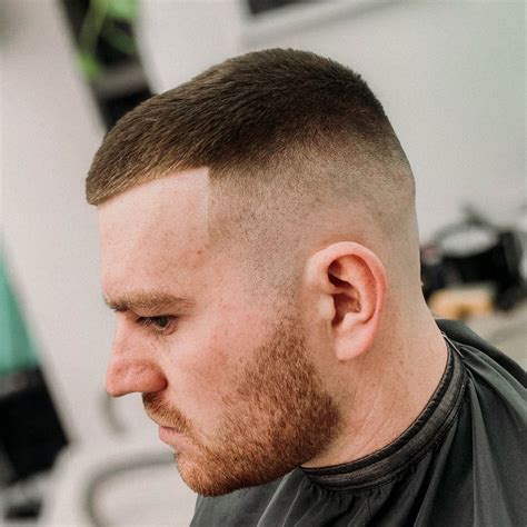 Women Barbers Giving Buzz Haircut