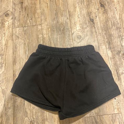 Black sweatpants shorts - Depop