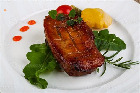 Roasted duck breast 8410177 Stock Photo at Vecteezy