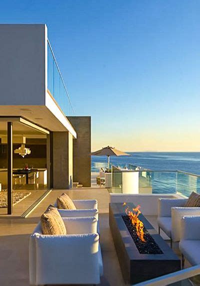 Contemporary Beach House With Balcony Overlooking The Ocean