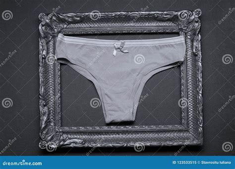 Grey Panties In A Wooden Photo Frame Stock Image Image Of Print