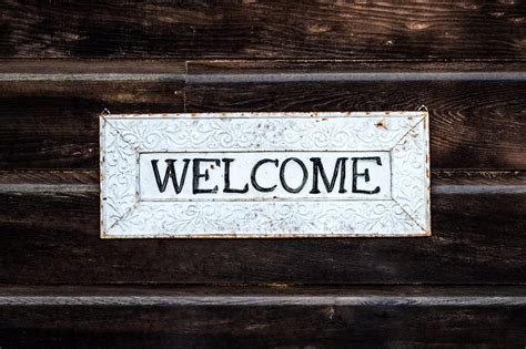 Black and White Wooden Welcome Sign · Free Stock Photo