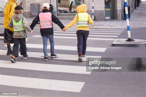 Child Crossing Road Photos And Premium High Res Pictures Getty Images