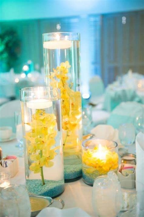 Submerged Yellow Orchids And Floating Candle Wedding Centerpieces OCLA