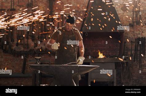 I Take Scrap And Turn It Into A Masterpiece A Metal Worker Hitting A Hot Metal Rod With A