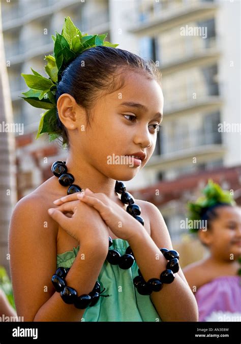 Young Hawaiian Girls Performing Traditional Hawaiian Hula Dances In