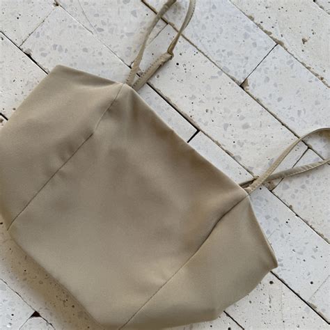 CONJUNTO CROPPED E SAIA MIDI BOTÕES E FENDA NUDE Dondoca Moda Feminina