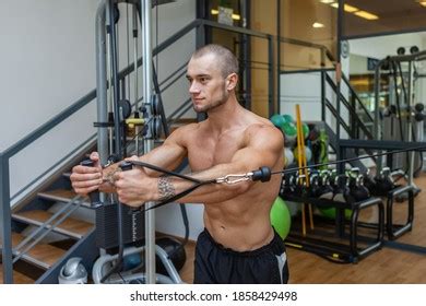 Muscular Bodybuilder Naked Torso Exercises Cable Stock Photo