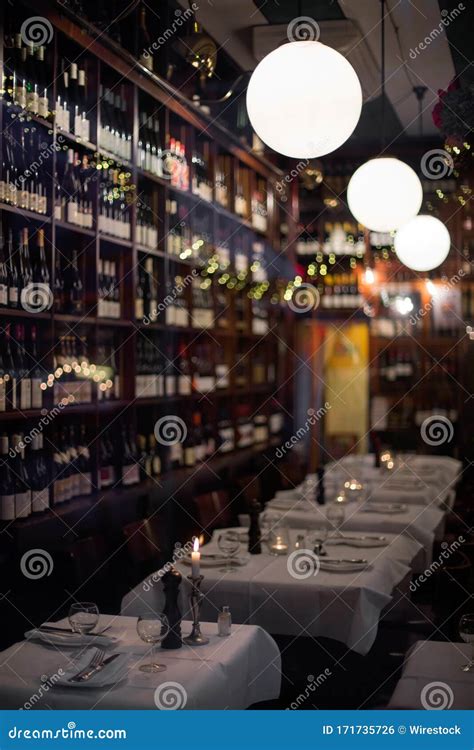 Vertical Shot Of Dinner Tables At A Restaurant Stock Photo Image Of