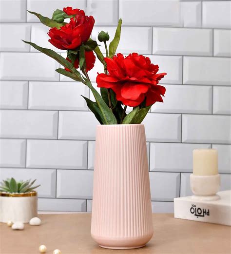 Buy Ribbed Pink Ceramic Vase at 38% OFF by Tayhaa | Pepperfry