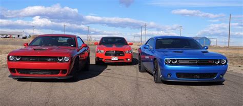 Dodge Challenger Hellcat vs. Supercharged AWD Charger Drag Race Is a ...