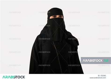 Portrait Of A Veiled Saudi Arabian Gulf Woman Wearing Traditional Saudi