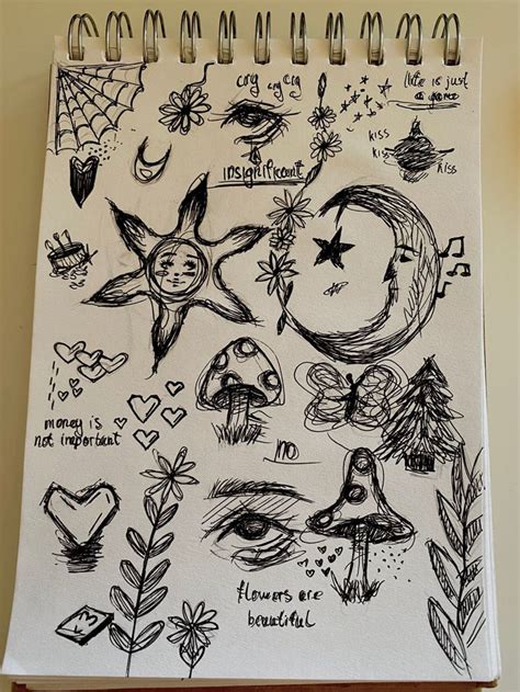 A Notebook With Some Drawings On It