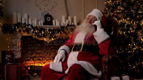 Modern Smiling Santa Claus Points Finger At Smartphone Green Screen Markers Stock Footage