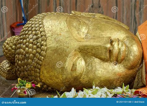 Golden Head of Reclining Buddha Statue on the Side of Parinirvana ...