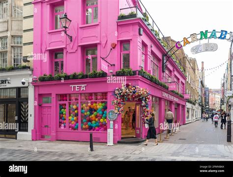 The Vibrant Pink Painted Exterior Of The Sophie Tea Art Gallery On The