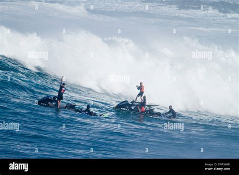 Surfing At The Eddie Aikau Big Wave Surfing Contest At Waimea Bay On The North Shore Of Oahu