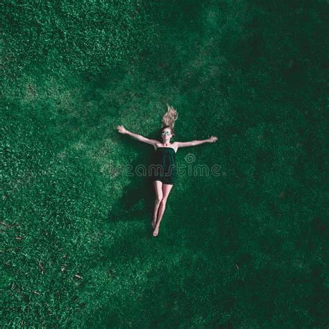 Aerial View Of Woman Lying On The Grass Stock Image Image Of Escapism Natural 126875165