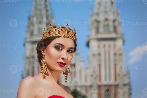 Beautiful Woman In Long Red Dress And In Royal Crown Nearly Catholic Cathedral 14483243 Stock