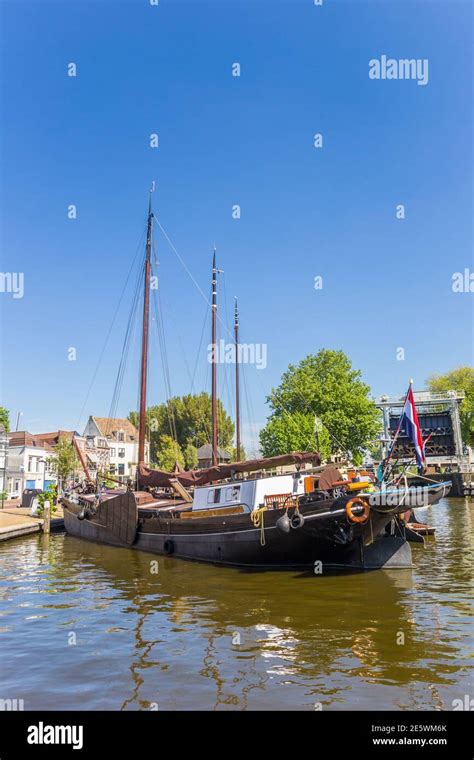 Old Wooden Sailing Ship In The Historic Harbor Of Gouda Netherlands