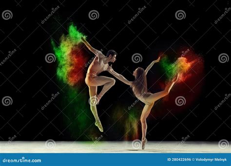 Beautiful Young Man And Woman Talented Ballet Dancers In Beige