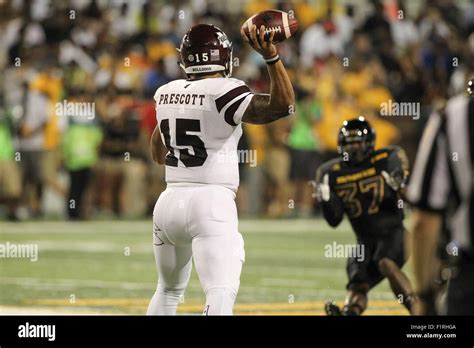 Mississippi State QB, Dak Prescott (9) looks for an over receiver ...