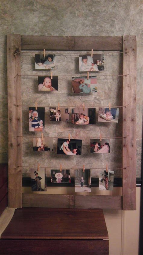 A Wooden Frame With Pictures Hanging On It