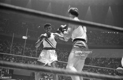 USA Cassius Clay in action during Men's Light-Heavyweight Gold Medal ...