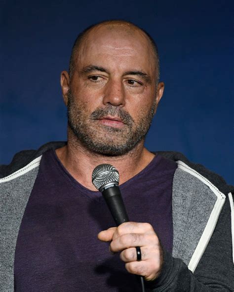 Download Joe Rogan Live Performance at a Comedy Show Wallpaper | Wallpapers.com