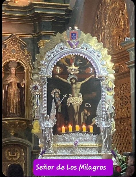 An Altar With Candles In Front Of It And The Image Of Jesus On The Cross