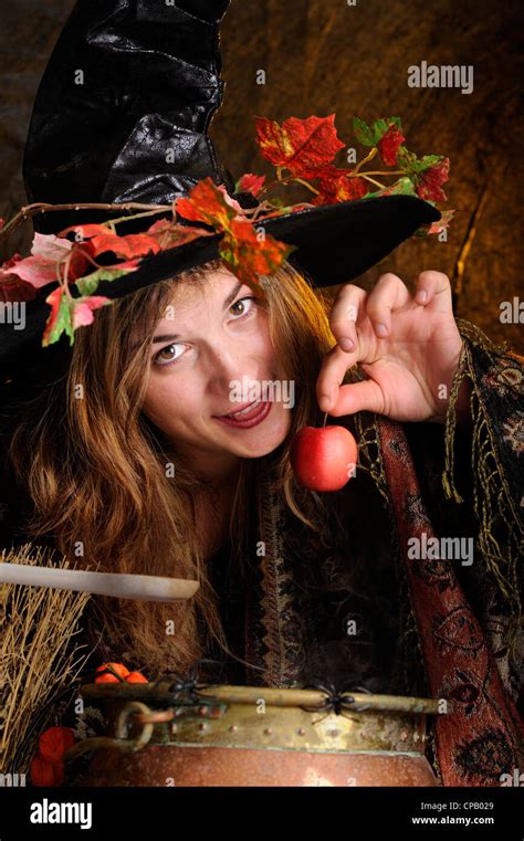 Halloween Witch Cooking In A Copper Boiler Stock Photo Alamy