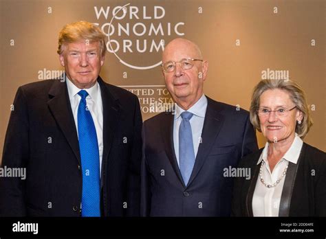 Handout President Donald Trump With Klaus And Hilde Schwab At The