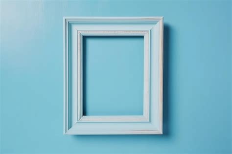 Un Marco Blanco En Una Pared Azul Foto Premium