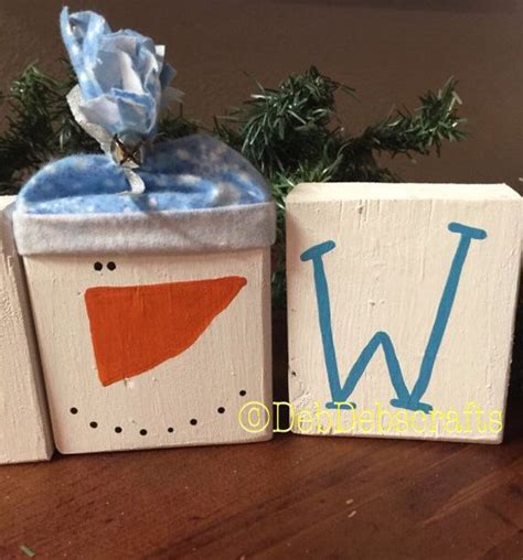 This Wooden Snowman Block Set Makes An Adorable Christmas Decoration