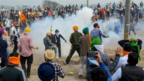 Protesting Farmers Met With Tear Gas Shells Barricades At Shambhu Khanauri Borders