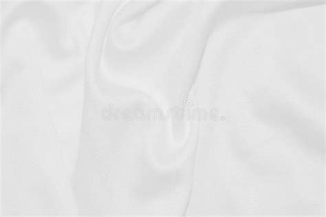 A Clean White Cloth With Swaying Streaks For The Background Stock Photo