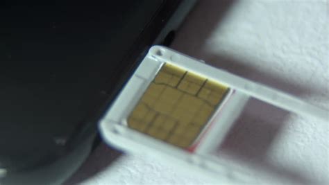 inserting nano sim memory card tray Stock Footage Video (100% Royalty ...