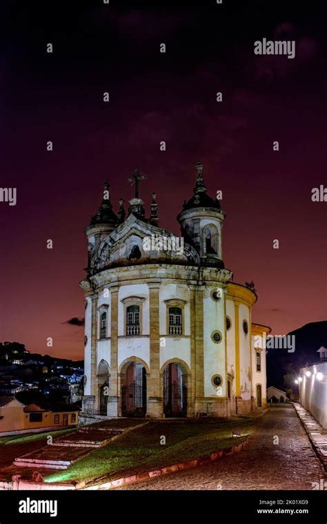 Old Baroque Church Illuminated At Dusk In The Historic Town Of Ouro