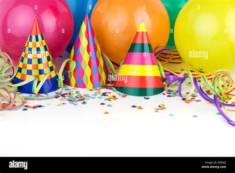 Balloons, streamers, confetti and party hats Stock Photo - Alamy