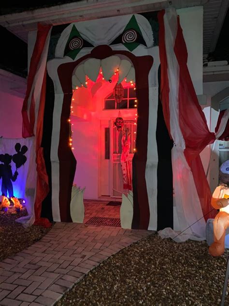 An Entrance To A House Decorated For Halloween