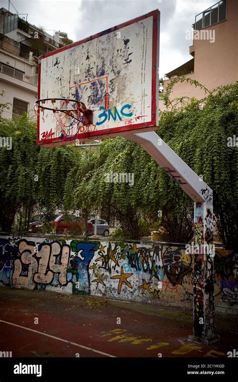 Graffitied Deserted Inner City basketball court Hoop Stock Photo - Alamy